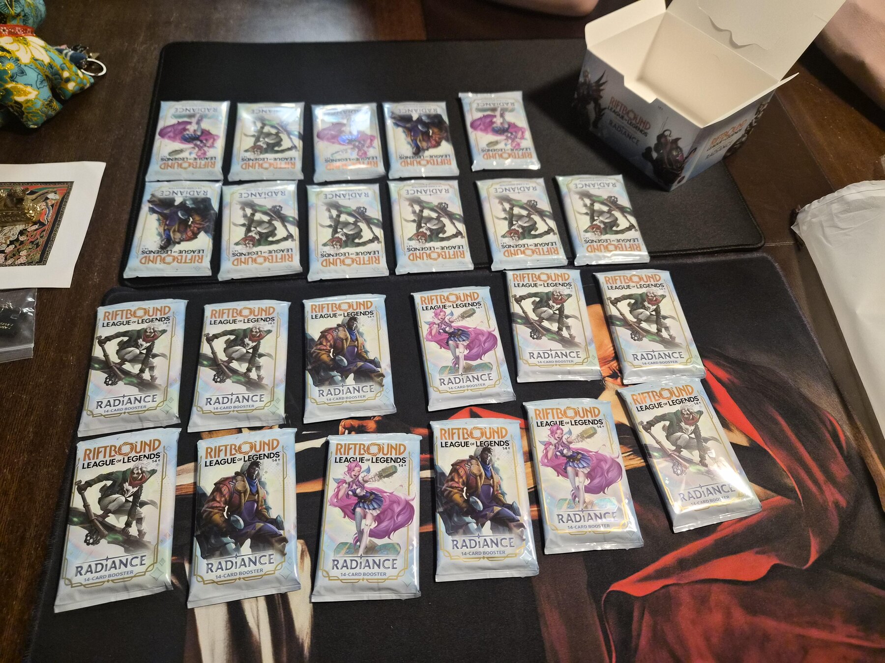 The 23 packs found inside a Riftbound Radiance booster display