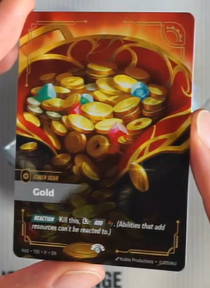 The Gold full art promo token from the Radiance Vault